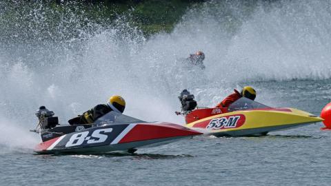 Two runabouts racing