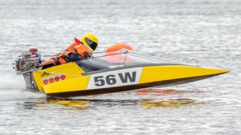 Yellow runabout racing