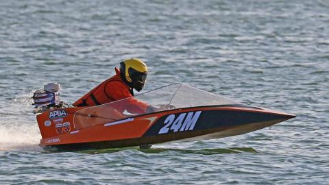 Orange and black A runabout racing